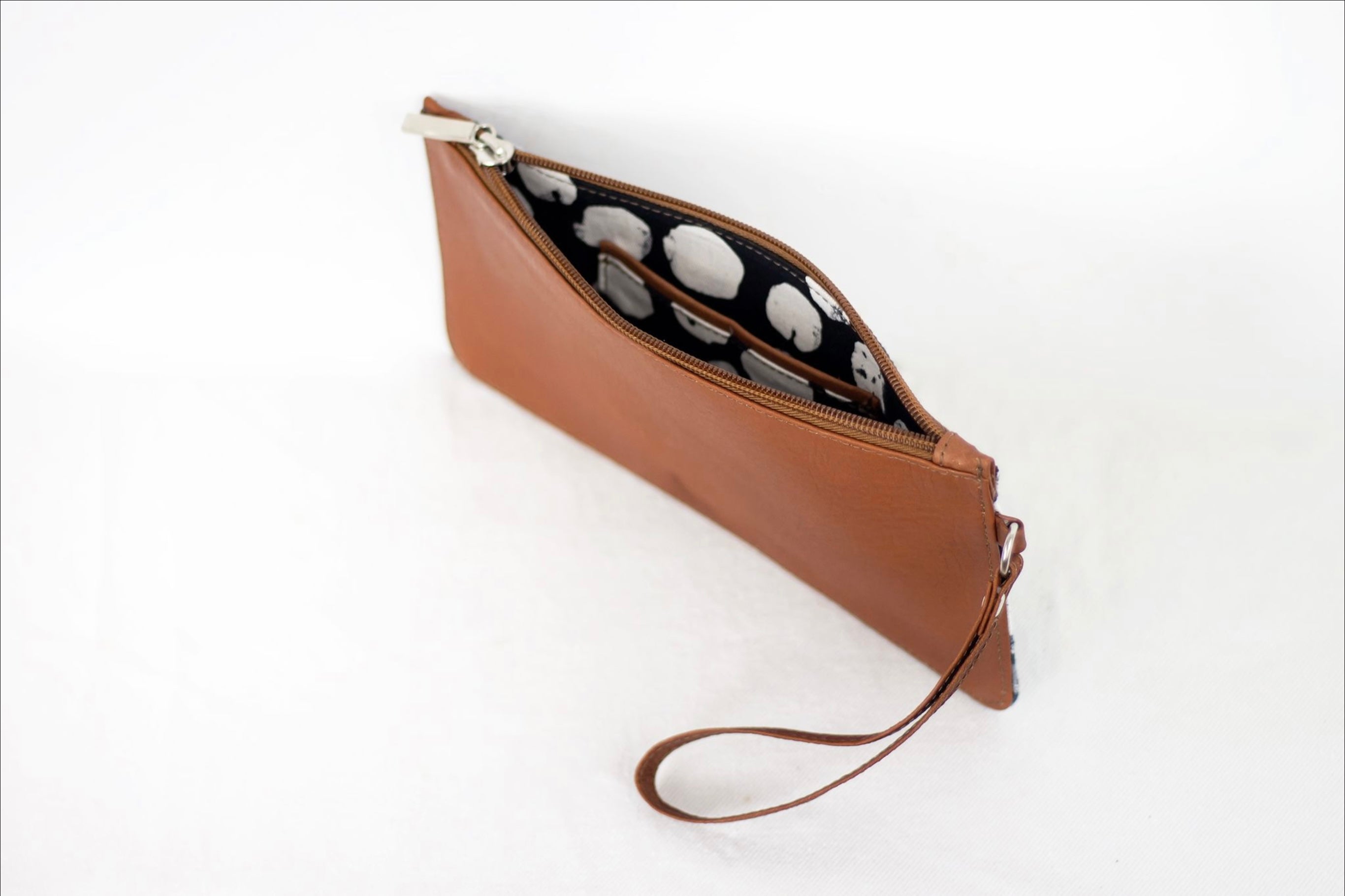 * Hand painted, leather trimmed clutch purse with the black and white “hula nights” pattern. #4