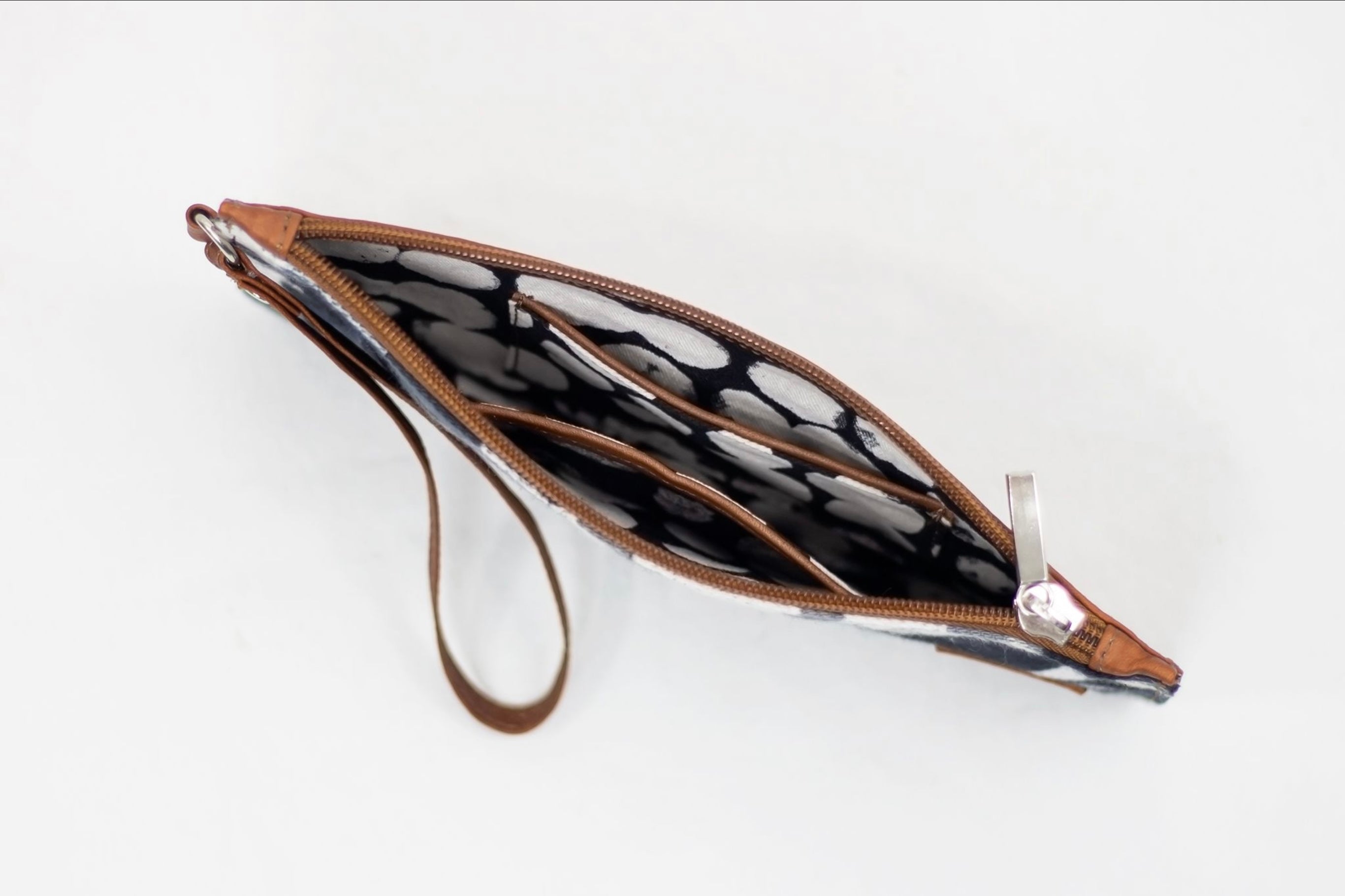 * Hand painted, leather trimmed clutch purse with the black and white “hula nights” pattern. #3