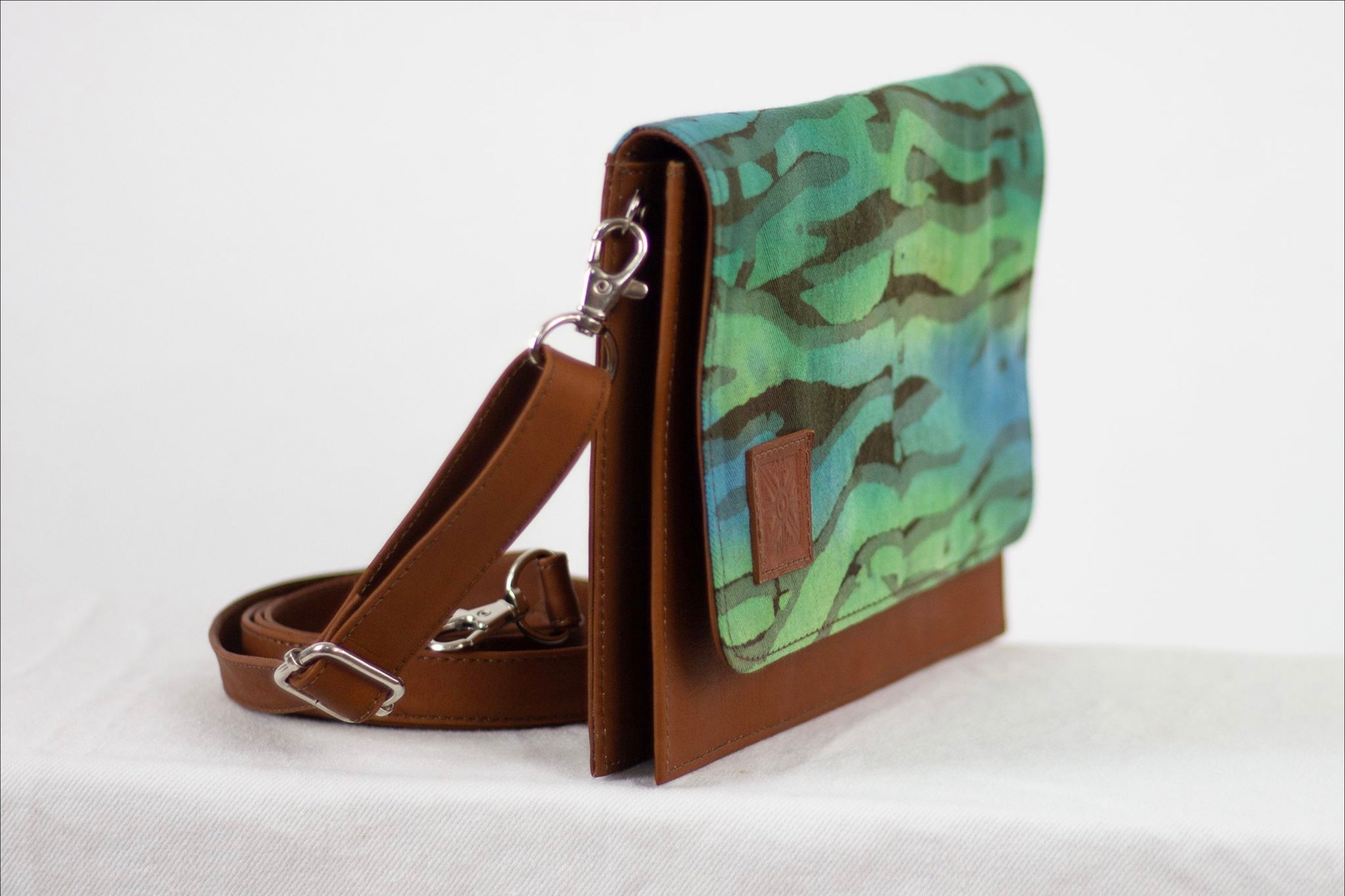 Hand painted, leather trimmed cross body tote with the green and blue “Boo Verdi Blue” pattern #3