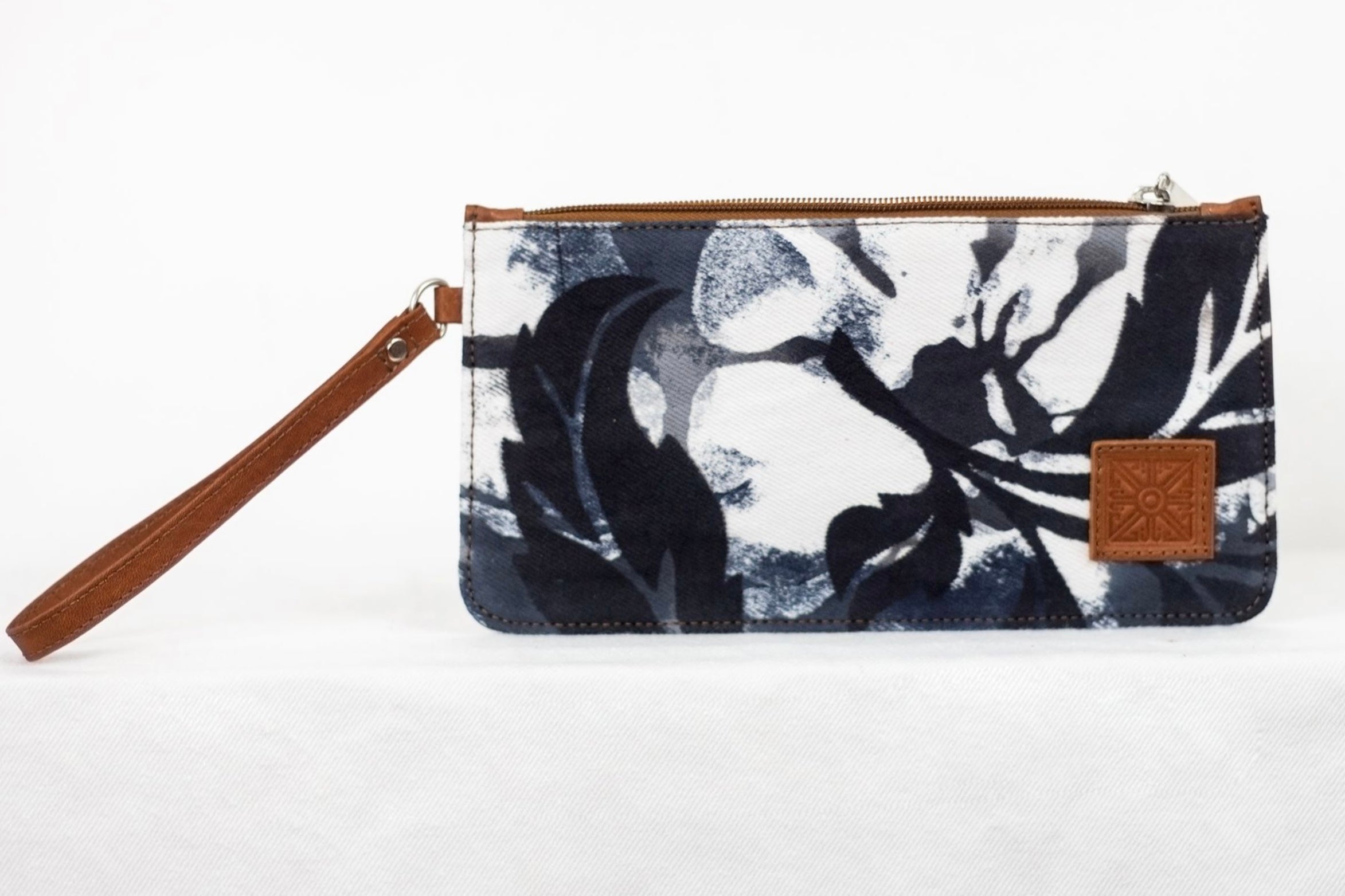 * Hand painted, leather trimmed clutch purse with the black and white “hula nights” pattern. #1