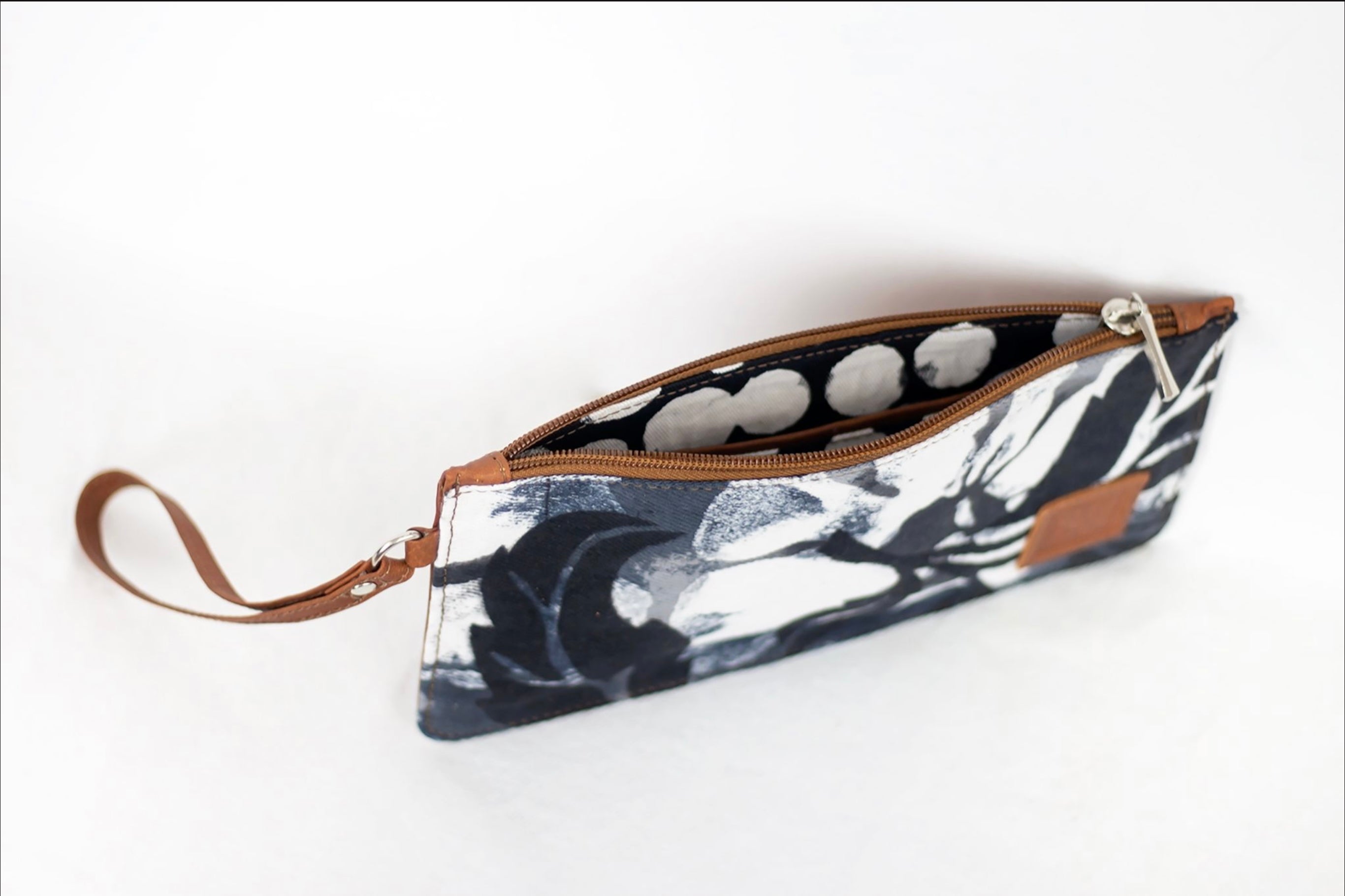 * Hand painted, leather trimmed clutch purse with the black and white “hula nights” pattern. #2