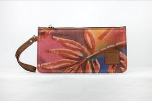 Hand painted, leather trimmed clutch purse with the red, orange and blue “fire palm” pattern. #1