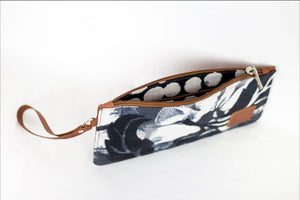     * Hand painted, leather trimmed clutch purse with the black and white “hula nights” pattern. #2